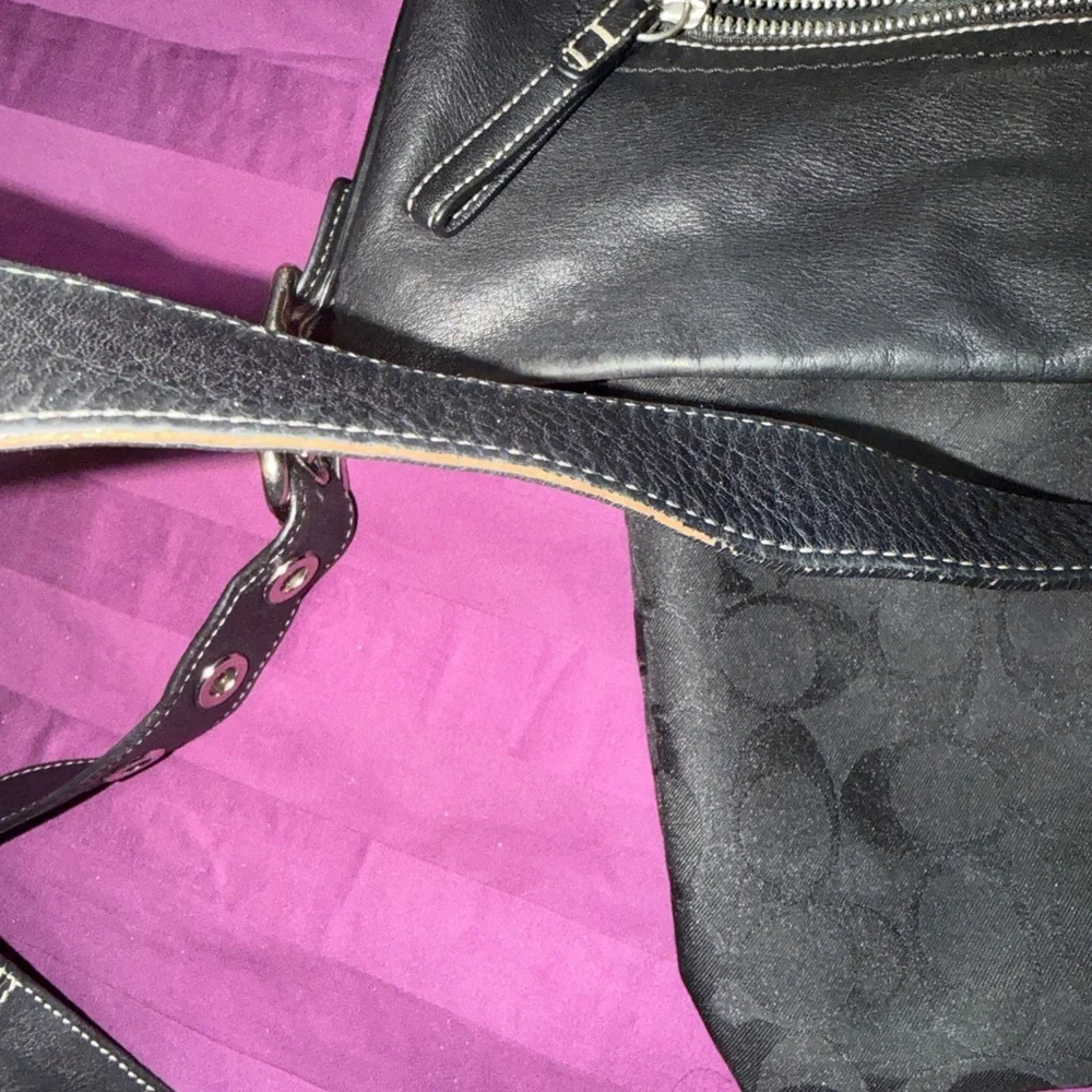Vintage Coach Legacy 1415 Slim Duffle shoulder Bag in black with white stitching